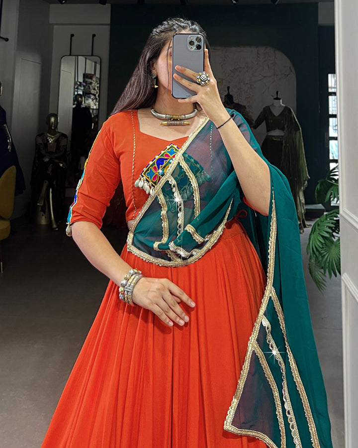 Orange Color Rayon Embossed Navratri Lehenga Choli