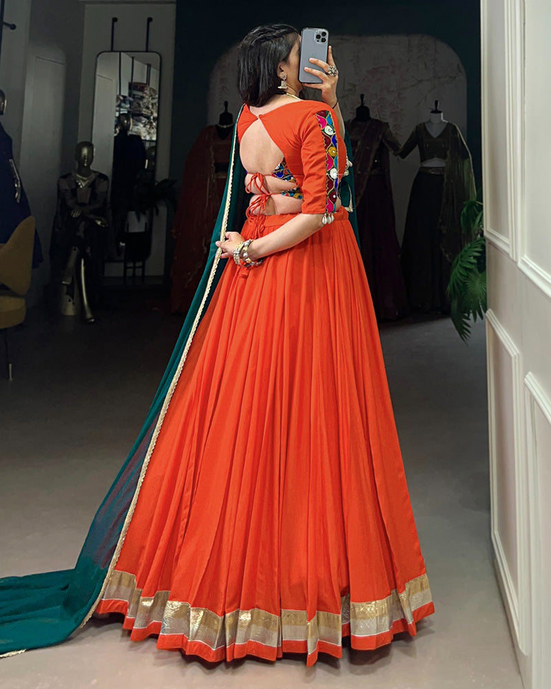 Orange Color Rayon Embossed Navratri Lehenga Choli