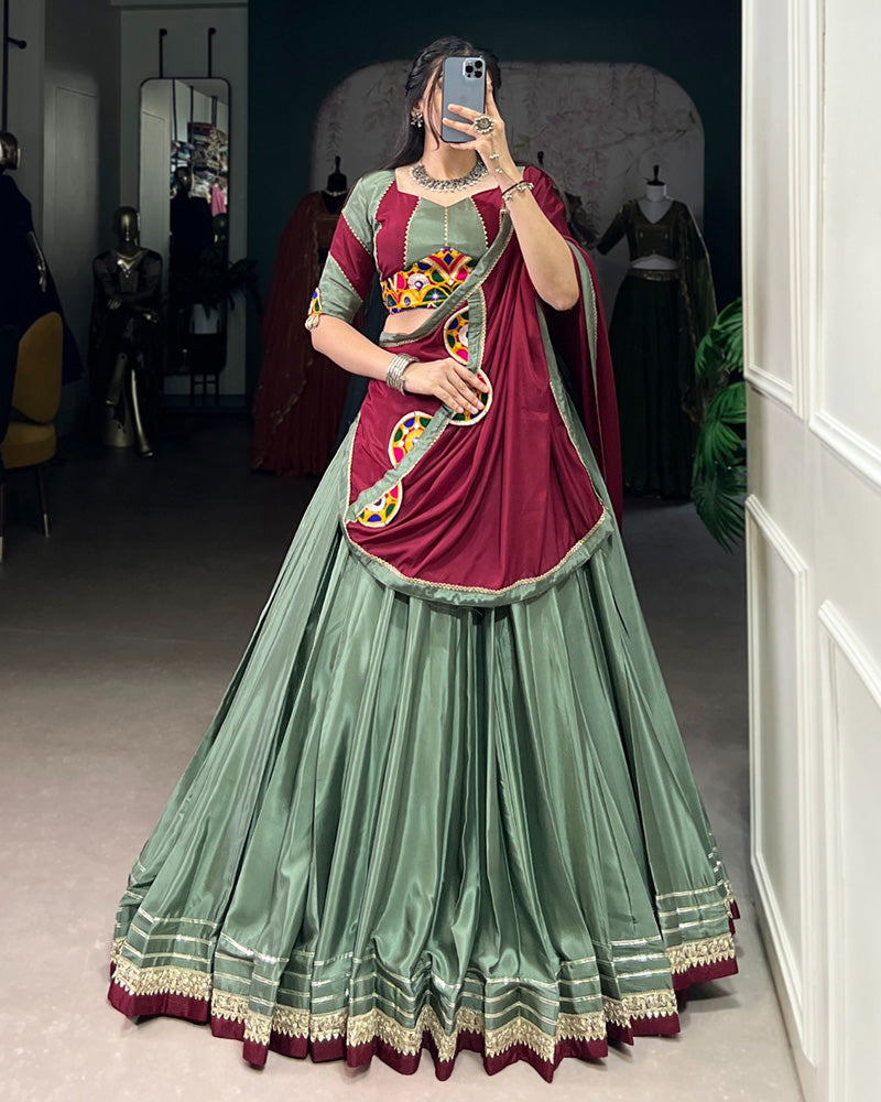 Graceful Green And Maroon Silk Crape Lehenga Choli With Elegant Dupatta
