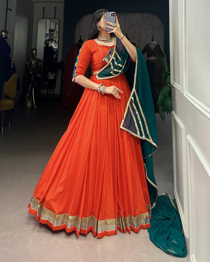 Orange Color Rayon Embossed Navratri Lehenga Choli