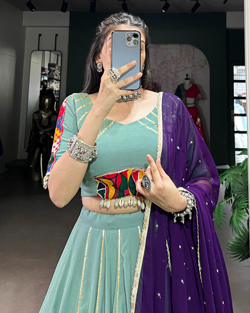 Sea Green Color Rayon Embossed Navratri Lehenga Choli