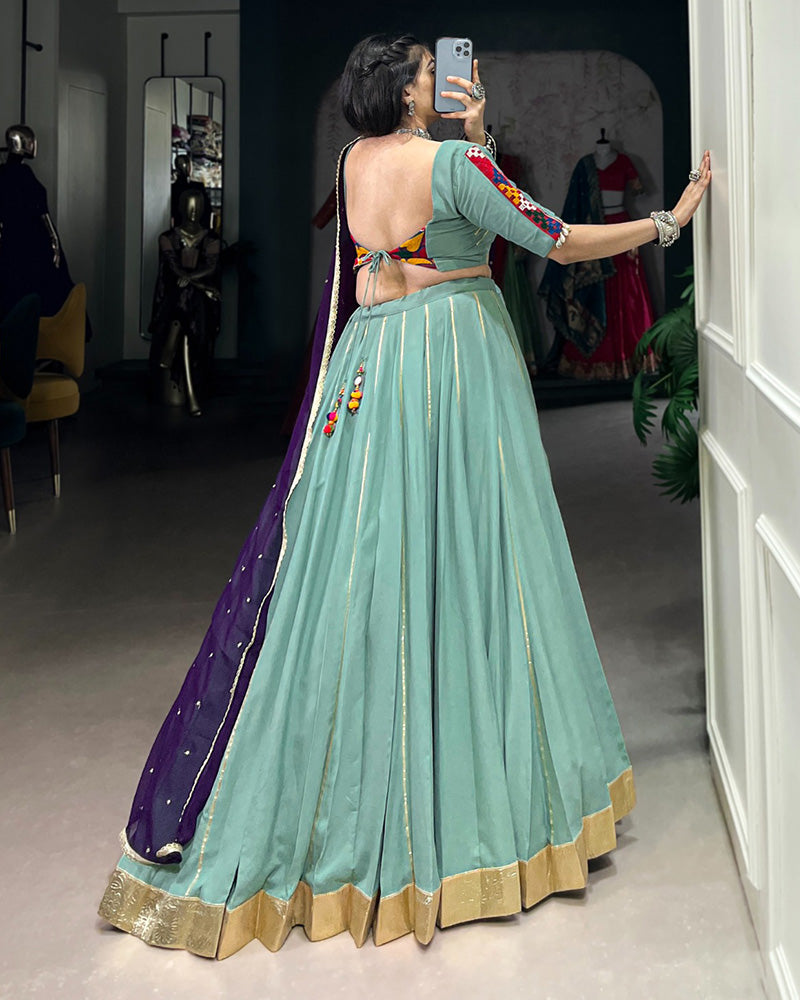 Sea Green Color Rayon Embossed Navratri Lehenga Choli