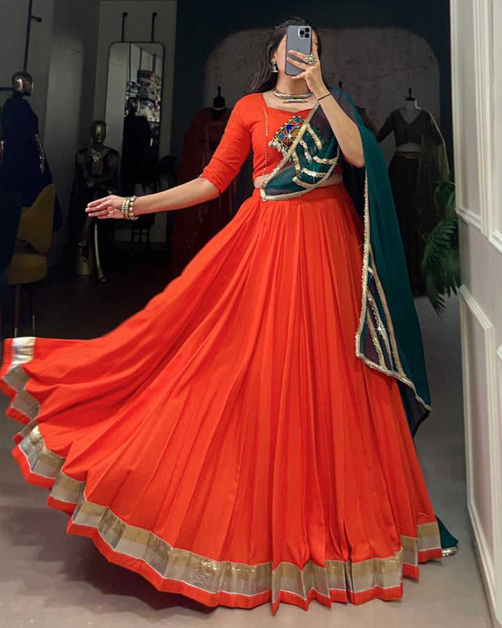 Orange Color Rayon Embossed Navratri Lehenga Choli