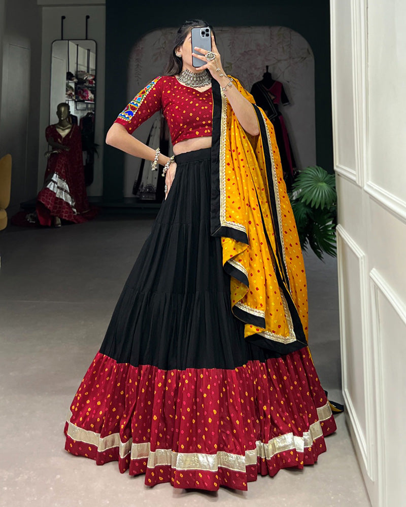 Black Color Rayon And Silk Ruffle Style Navratri Lehenga Choli