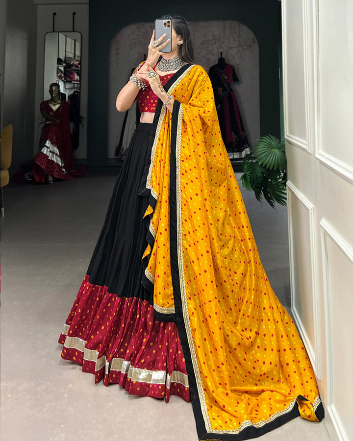 Black Color Rayon And Silk Ruffle Style Navratri Lehenga Choli