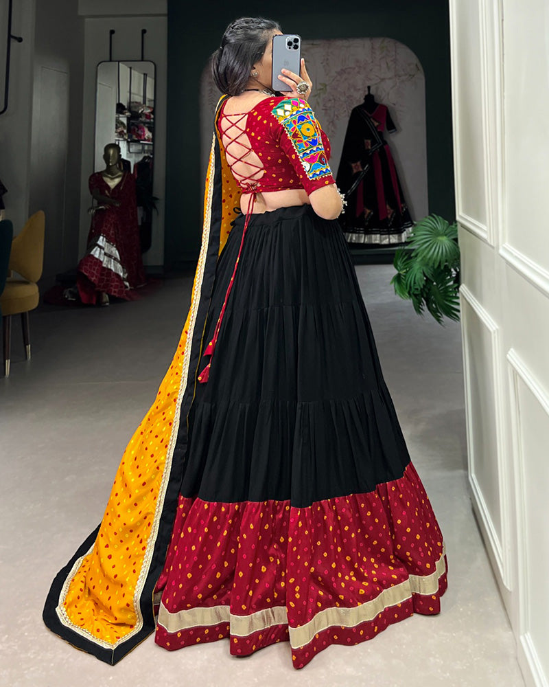 Black Color Rayon And Silk Ruffle Style Navratri Lehenga Choli