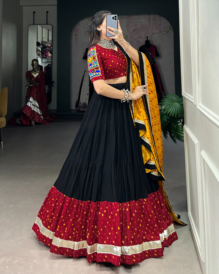 Black Color Rayon And Silk Ruffle Style Navratri Lehenga Choli
