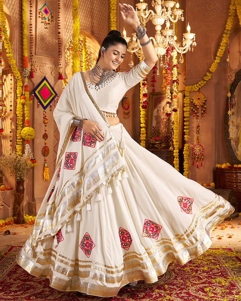 Royal White Lehenga Choli With Gold Borders And Colorful Embroidery
