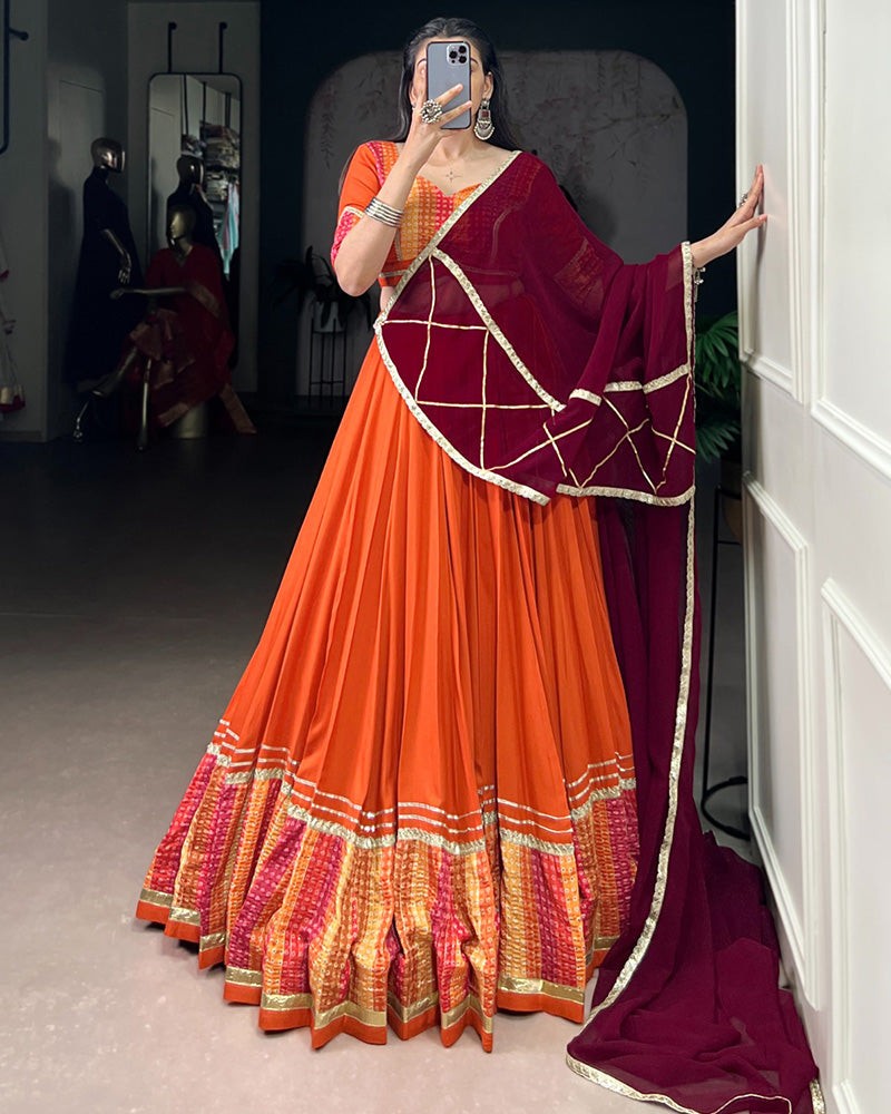 Orange Color Rayon Bnahdej Print Navratri Lehenga Choli