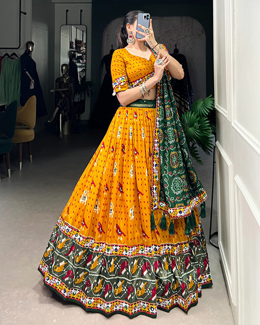 Mustard Color Tussar Silk Patola Printed Navratri Lehenga Choli