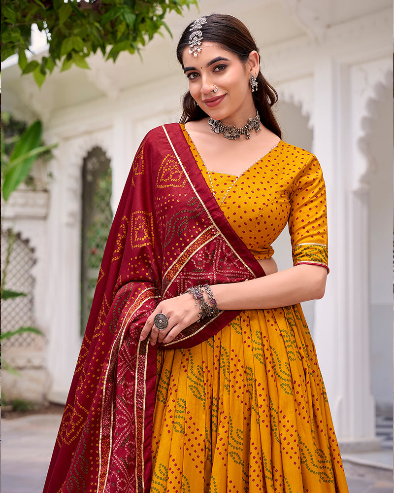 Elegant Yellow Color Tussar Silk Bandhej Navratri Lehenga Choli