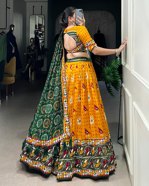 Mustard Color Tussar Silk Patola Printed Navratri Lehenga Choli
