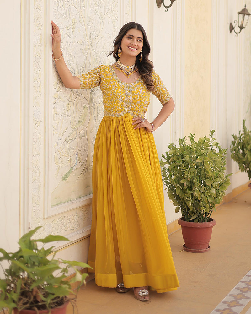 Yellow Color Faux Blooming Zari sequence Embroidered Gown
