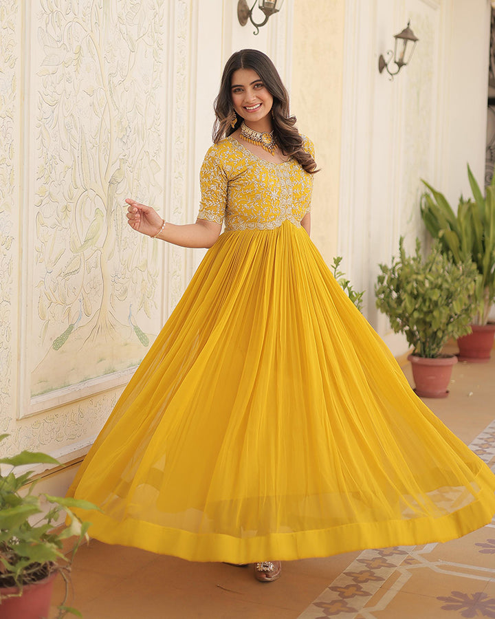Yellow Color Faux Blooming Zari sequence Embroidered Gown