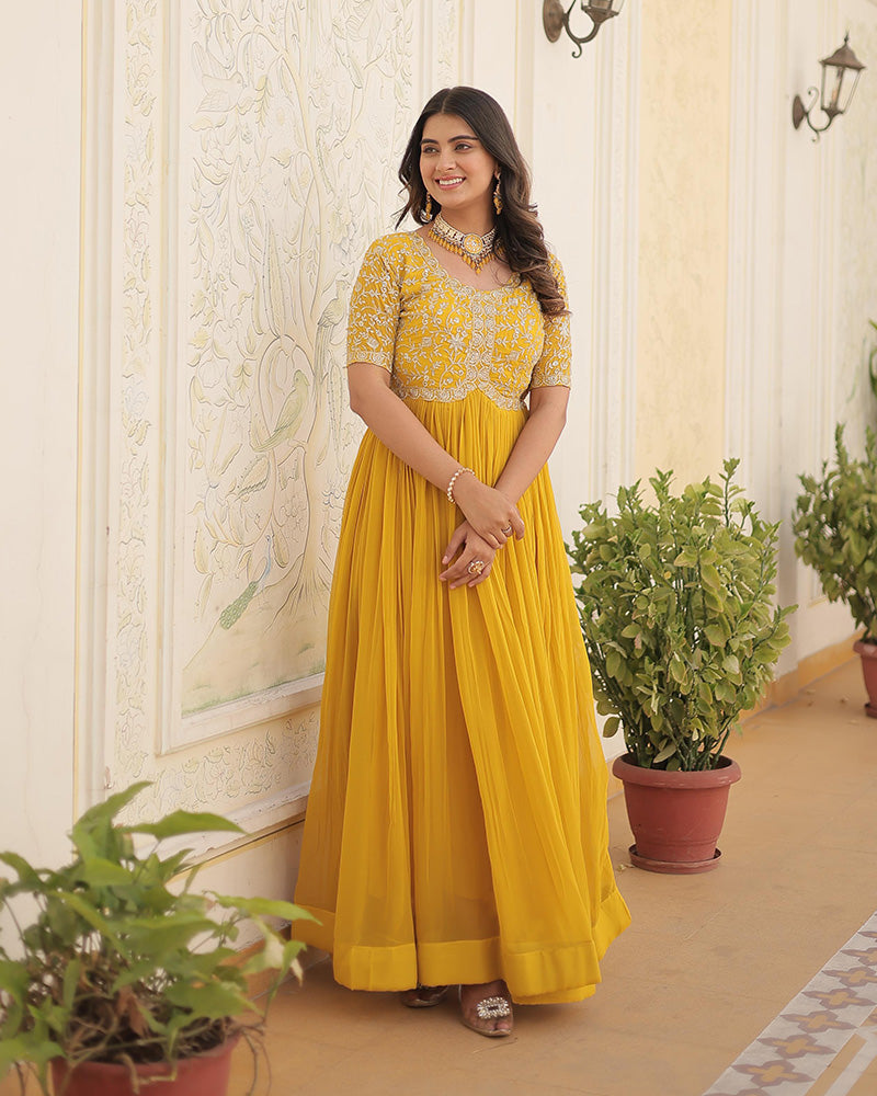 Yellow Color Faux Blooming Zari sequence Embroidered Gown