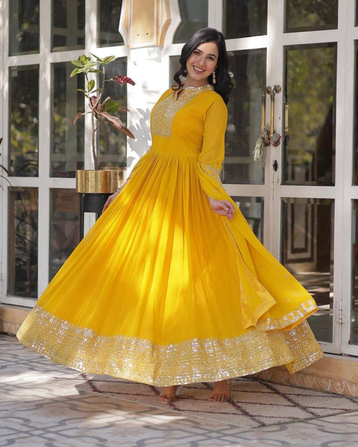 Yellow Color Faux Blooming Rich Embroidered Work Gown