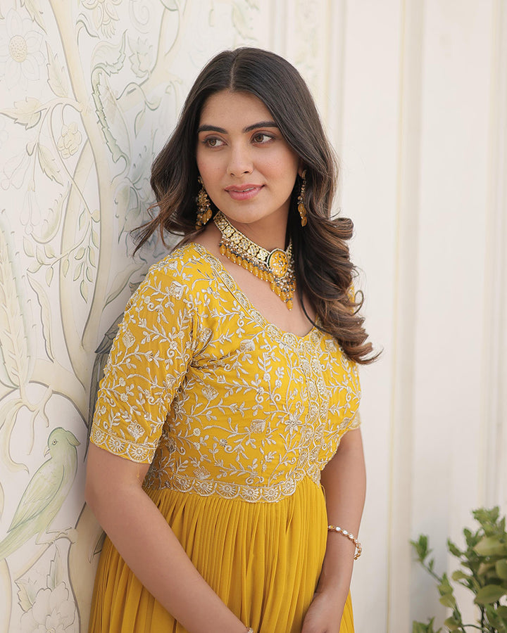 Yellow Color Faux Blooming Zari sequence Embroidered Gown