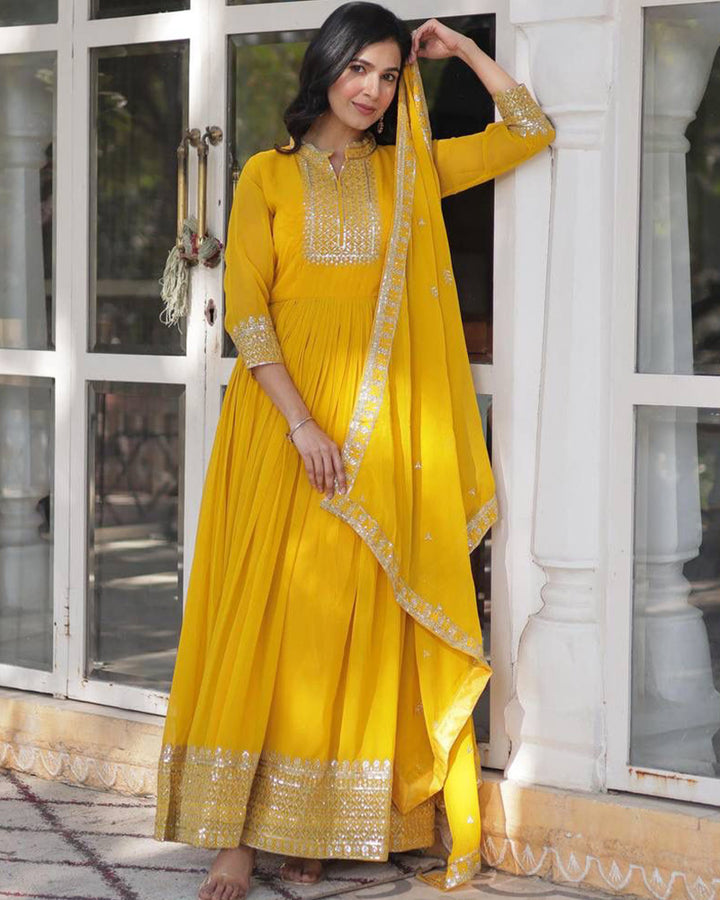 Yellow Color Faux Blooming Rich Embroidered Work Gown