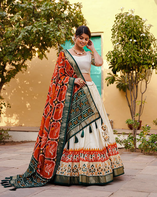 Designer Orange Color Silk Lehenga Choli With Patola Print Dupatta