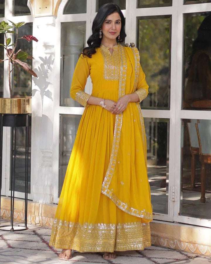 Yellow Color Faux Blooming Rich Embroidered Work Gown