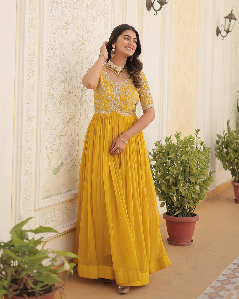 Yellow Color Faux Blooming Zari sequence Embroidered Gown