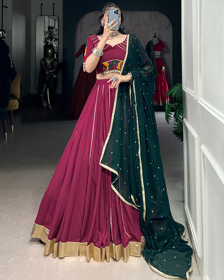 Plum Color Rayon Embossed Navratri Lehenga Choli