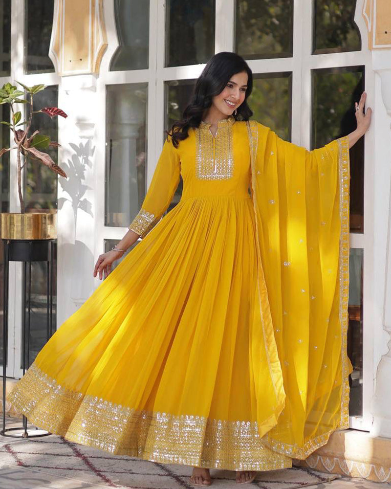 Yellow Color Faux Blooming Rich Embroidered Work Gown