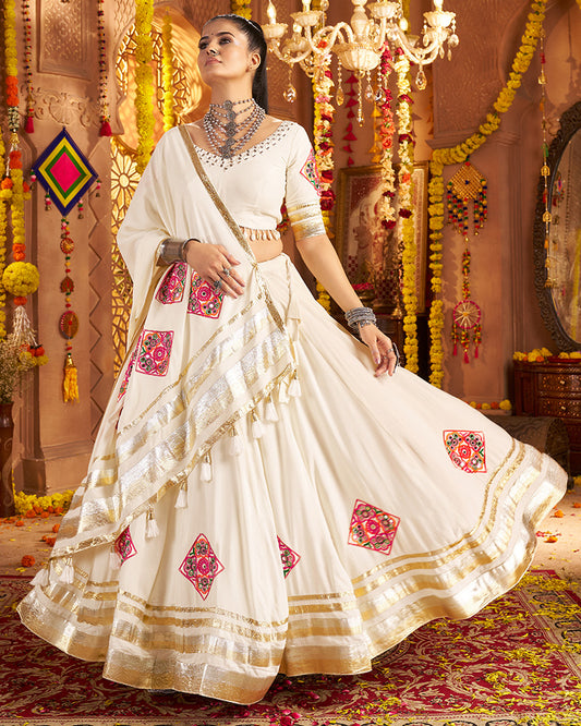 Royal White Lehenga Choli With Gold Borders And Colorful Embroidery