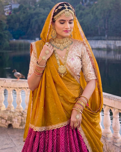 Royal Marwadi Pink Color Bandhani And Ajarakh Print Lehenga Set