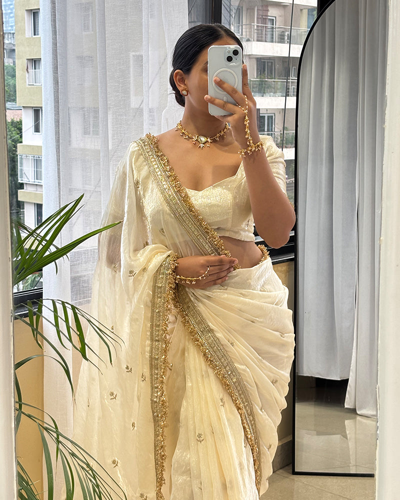 Cream Color Space Satin Embroidered Saree