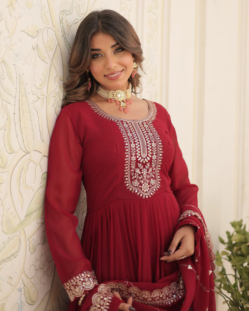 Maroon Color Faux Blooming Rich Sequence Embroidered Gown