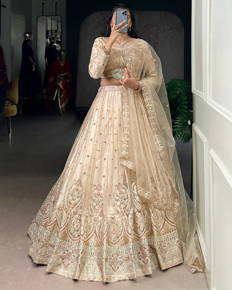 Cream Color Soft Net Embroidered Lehenga Choli