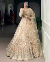 Cream Color Soft Net Embroidered Lehenga Choli
