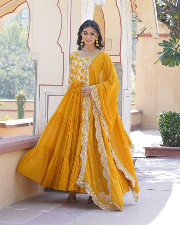 Yellow Color Anarkali Gown With Faux Blooming Dupatta