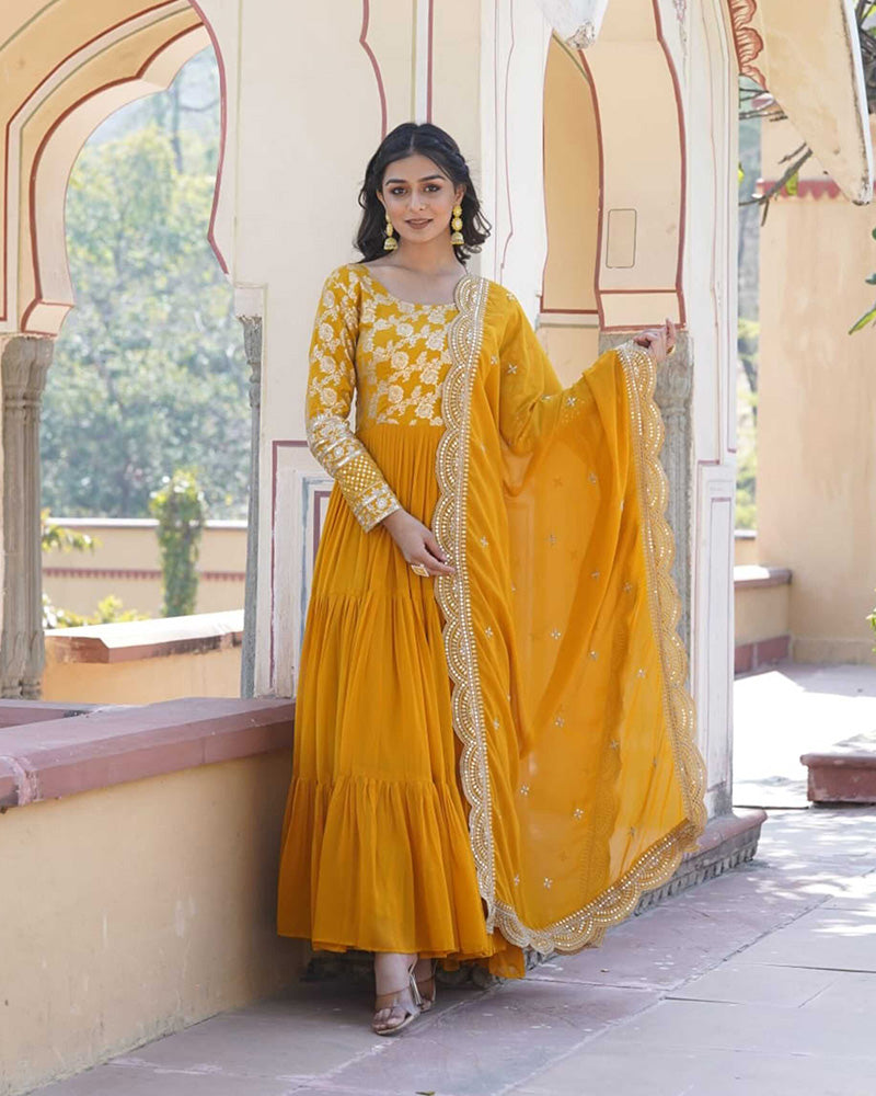 Yellow Color Anarkali Gown With Faux Blooming Dupatta