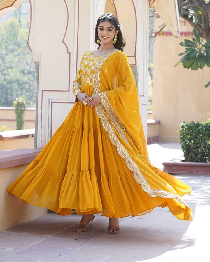 Yellow Color Anarkali Gown With Faux Blooming Dupatta
