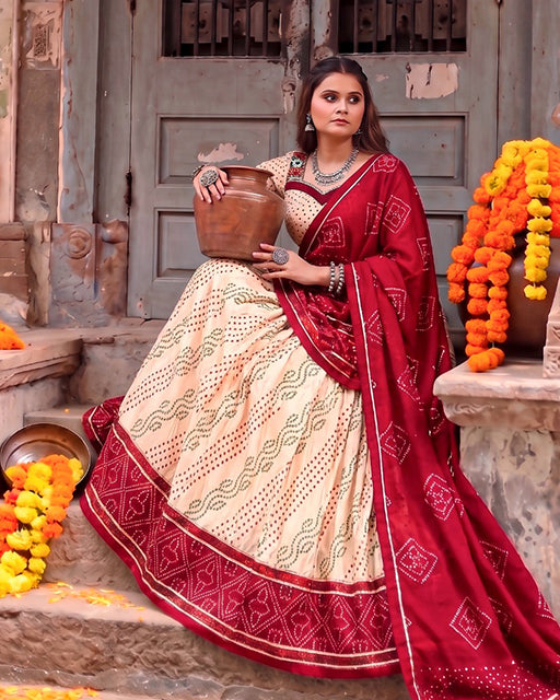 Off White Color Pure Tussar Silk Bandhani Print Navratri Lehenga Choli
