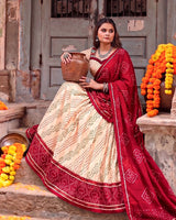 Off White Color Pure Tussar Silk Bandhani Print Navratri Lehenga Choli