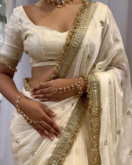 Cream Color Space Satin Embroidered Saree