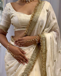 Cream Color Space Satin Embroidered Saree