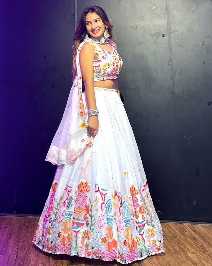 Kiran Rana in White Floral Nine Color Threaded Embroidered Soft Georgette Semi Stitched Lehenga Choli